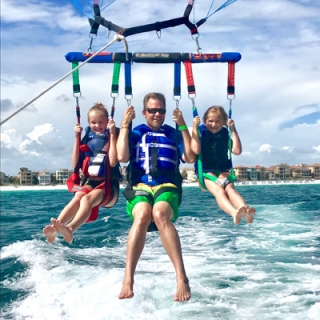 A Dip with the Dolphins Morning Parasailing on Okaloosa Island